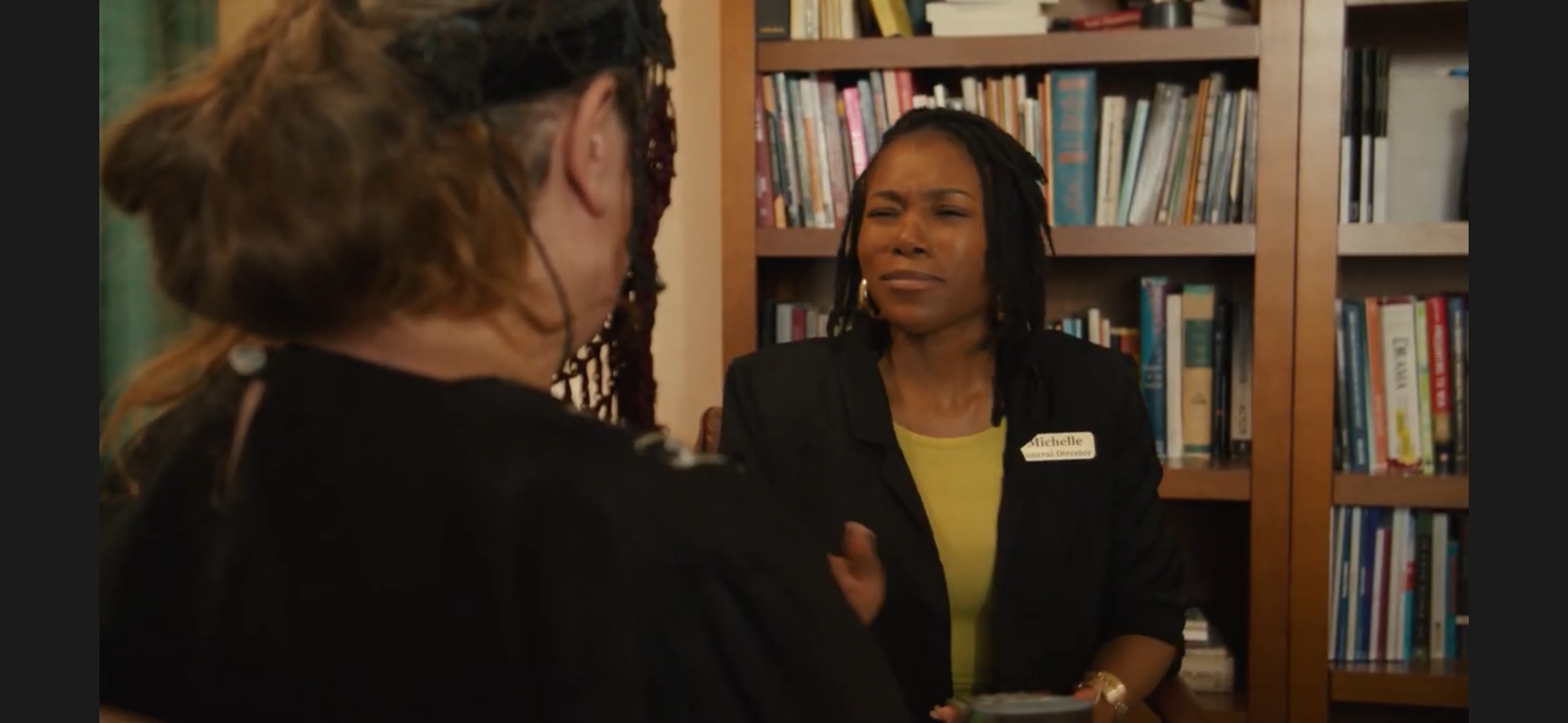 A screen grab from one of our favorite moments of the film: "I know we were racist to you for all these years, but can you find it in your heart to give me a payment plan?"